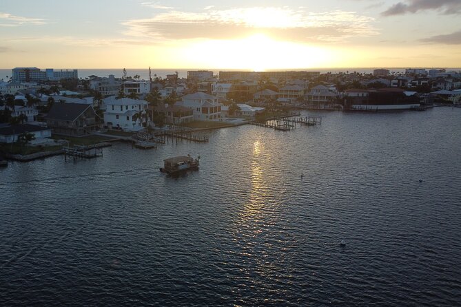 2 hour Tiki Pub Sensational Dolphin Sunset Cruise (Adults only) - Music, dancing, karaoke, and the small-boat social scene