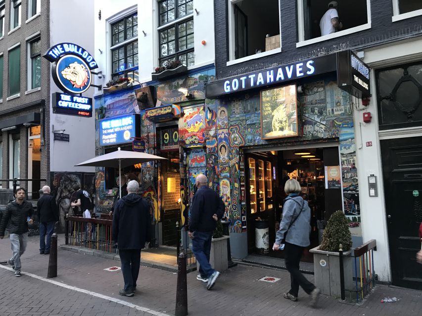 Amsterdam: Red Light District and Local Pub Tour - Oude Kerk and the narrow lanes of Warmoesstraat