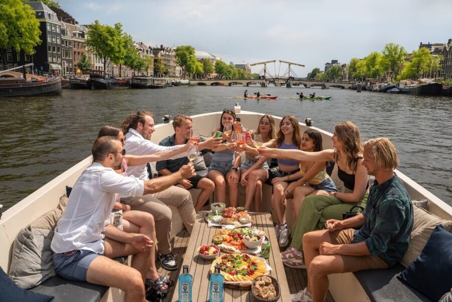 Amsterdam: Red-Light District Pub Crawl and Booze Boat Tour - Four bars through the Red Light District