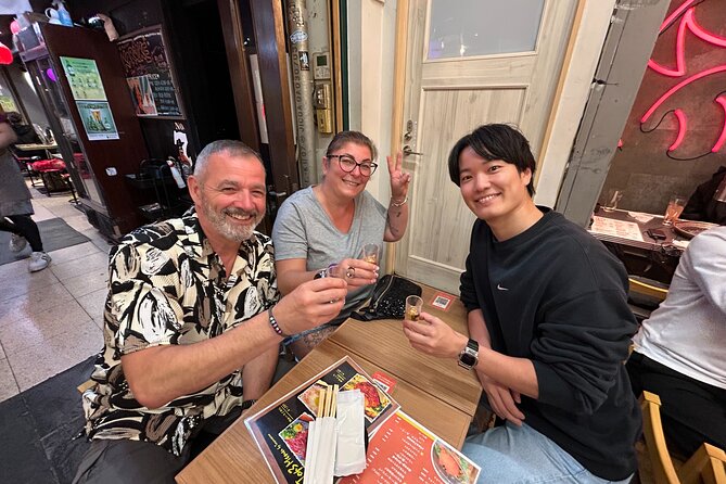 Conveyor Belt Sushi & Bar Hopping in Ebisu & Nakameguro - Choosing plates at conveyor belt sushi