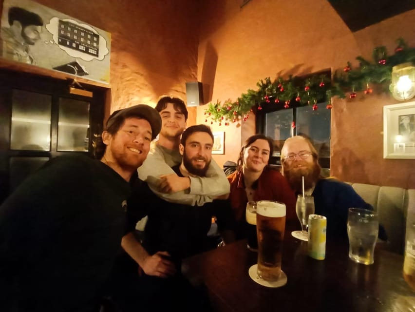 Dublin: Pub Tour. Pour The Perfect Guinness, Whiskey & Music - Temple Bar beyond the famous pub signs