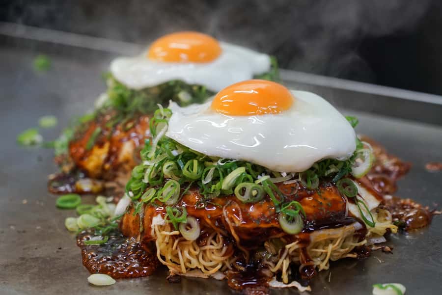 Hiroshima: Bar Hopping Food Tour - Second stop: izakaya dishes and Hiroshima sake