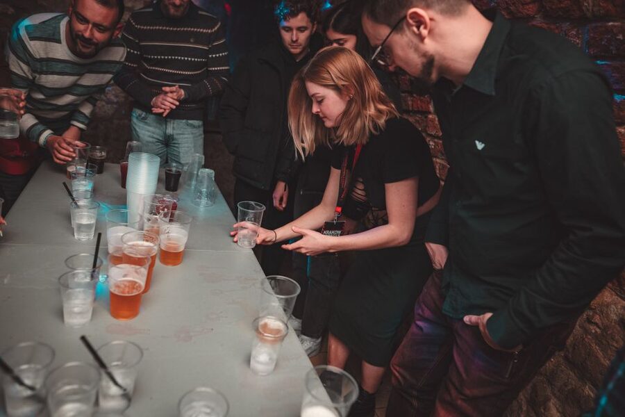 Krakow: Pub Crawl with 1 Hour of Unlimited Alcoholic Drinks - VIP entry, welcome shots, and the practical value