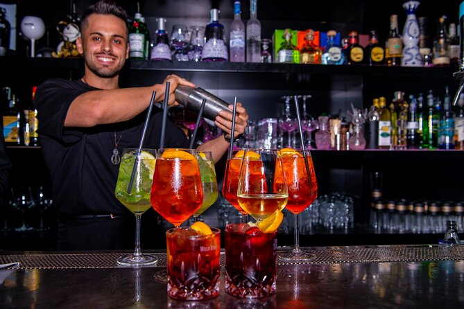 Lisbon Pub Crawl Walking Tour with Drinks Included - Exploring Bairro Alto, Lisbon’s nightlife hub
