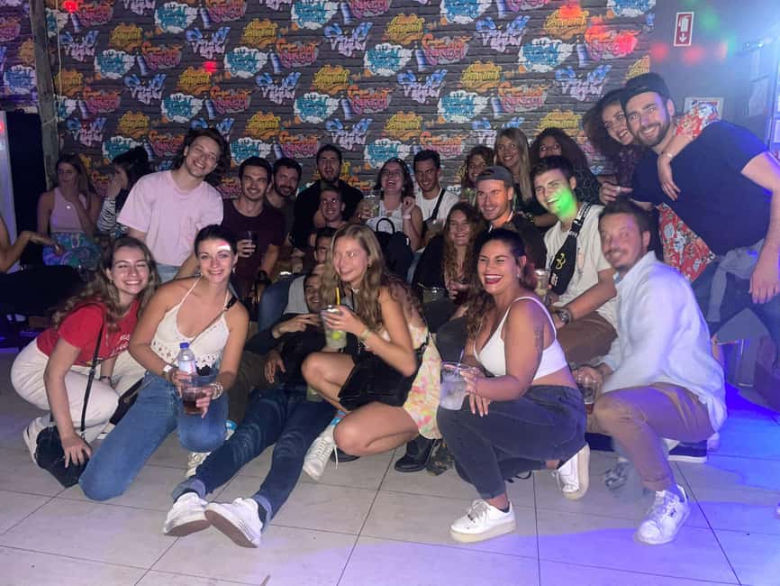 Lisbon: Pub Crawl with Open Bar (Premium Upgrade Available) - Walking toward Pink Street
