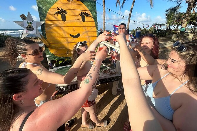 Pinones Bar Hopping Beach Food Tour & Caguas River Hidden Gem - The boardwalk, beach views, and roadside drinks