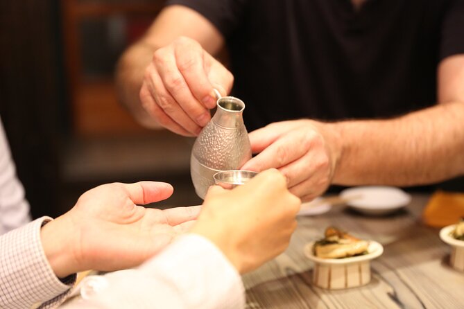 Private Food & Sake Tour in Central Kyoto with Sake Sommelier - Stop one: a traditional machiya izakaya