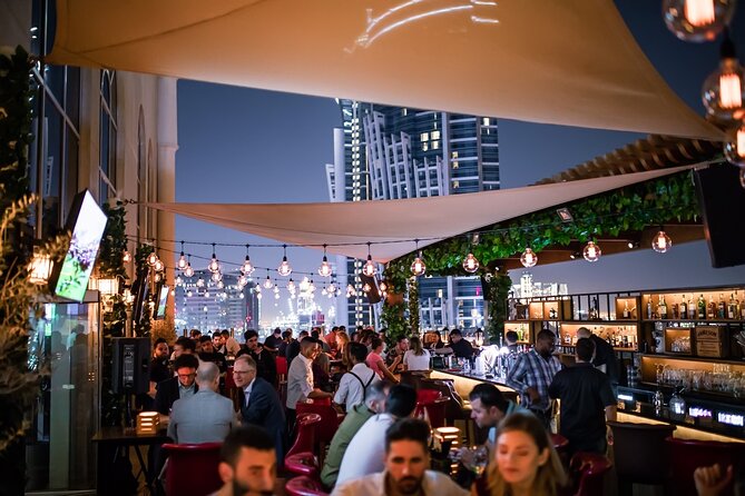 Pub Crawl Dubai: Nightlife Tours - Stop one: rooftop views in Downtown Dubai or the Marina