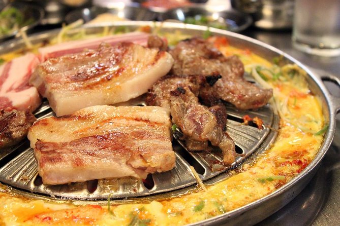 Seoul: Anthony Bourdain-Inspired BBQ and Pub Experience - Second stop: pancakes, market snacks, and rice wine