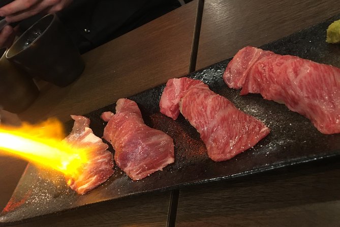 Shibuya Meltdown Nightlife Tour: All-You-Can-Drink Bar Hopping - Wagyu Niku Yokocho, where the meal really begins