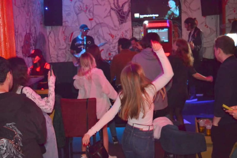 Tbilisi: City Pub Crawl with welcome shots in game format - Walking through Sololaki between venues