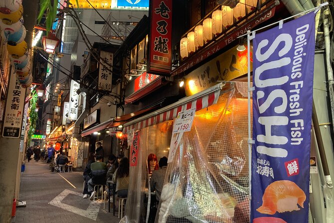Tokyo Shinjuku Japanese Local Bar Hopping and Food Tour - Shinjuku Golden Gai: tiny bars and a different mood