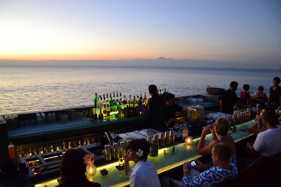 Uluwatu: Beach Club and Cliffside Private Bar Hopping Tour - Rock Bar at the right moment
