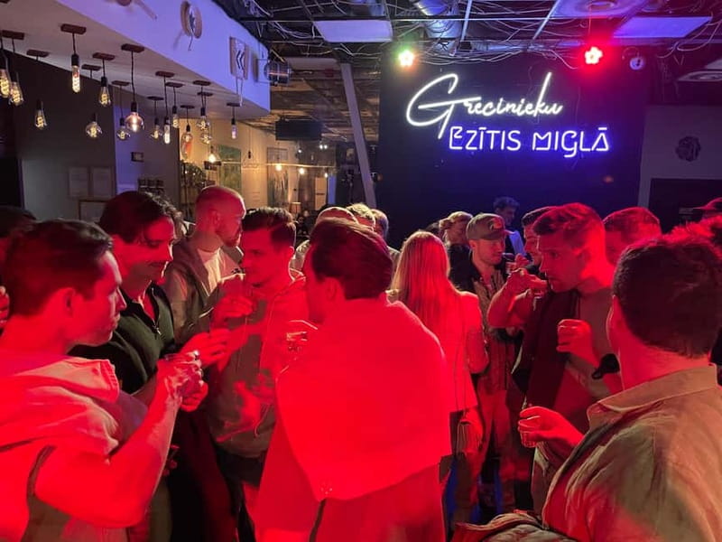 Vilnius: Pub Crawl with Welcome Drink and Traditional Snacks - Starting in Vilnius Old Town after sunset